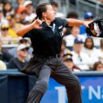 MLB's female ump leaves both teams fuming with odd calls, NASCAR wife hits the beach & Aaron Rodgers emerges!