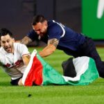 Yankee stadium security tackles field invader waving Palestinian flag during 9/11 anniversary game